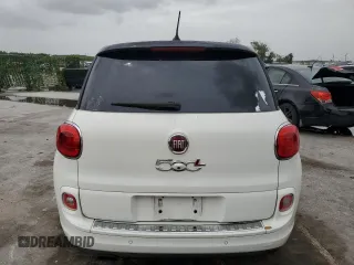 2014 FIAT 500L Easy with VIN ZFBCFABH0EZ000672, listed as a Copart auction lot 62691854 with 60,941 mi miles and Salvage Title. Bid and sale history available at DreamBid. Image 6.