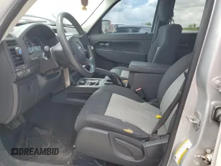 2010 Jeep Liberty Sport with VIN 1J4PN2GK2AW144063, listed as a Copart auction lot 58055585 with 132,580 mi miles and Salvage title. Bid and sale history available at DreamBid. Image 7.
