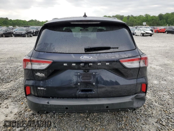 2021 Ford Escape SEL с VIN 1FMCU0H64MUB09355, выставлен на аукционе Copart как лот 54846655 с пробегом 55 660 миль миль и Списание • Salvage title. История ставок и продаж доступна на DreamBid. Изображение 6.