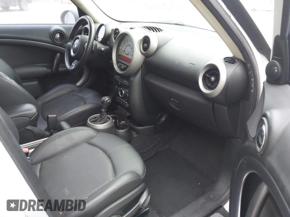 2011 MINI Countryman S with VIN WMWZC3C52BWL78647, listed as a IAAI auction lot 42459886 with 142,407 mi miles and . Bid and sale history available at DreamBid. Image 5.