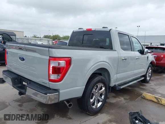 2023 Ford F-150 XL with VIN 1FTEW1CP4PKG23073, listed as a IAAI auction lot 41921112 with 13,643 mi miles and . Bid and sale history available at DreamBid. Image 4.