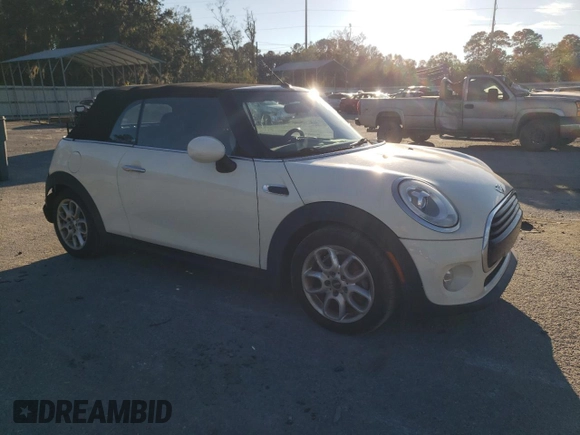 2017 MINI Convertible Cooper с VIN WMWWG5C32H3C20548, выставлен на аукционе Copart как лот 81914854 с пробегом 104 125 миль миль и Списание • Salvage title. История ставок и продаж доступна на DreamBid. Изображение 4.