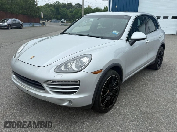 2012 Porsche Cayenne z VIN WP1AA2A23CLA09161, wystawiony jako Copart lot #60892115 z przebiegiem 168 458 mil mil oraz Czysty tytuł • Clean title. Historia ofert i sprzedaży dostępna na DreamBid. Obrazek 2.