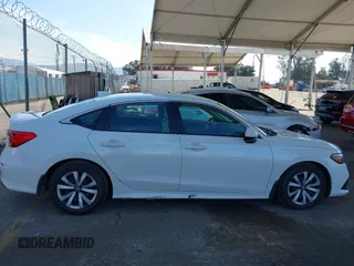 2023 Honda Civic Sedan LX with VIN 2HGFE2F2XPH531634, listed as a IAAI auction lot 41852064 with 24,458 mi miles. Bid and sale history available at carsss.com. Image 14.