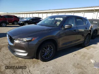 2020 Mazda CX-5 Touring with VIN JM3KFACM7L0846293, listed as a Copart auction lot 83097084 with 68,465 mi miles and Salvage Title. Bid and sale history available at carsss.com. Image 1.