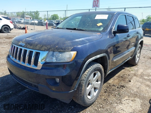2011 Jeep Grand Cherokee Laredo with VIN 1J4RR4GG8BC525701, listed as a IAAI auction lot 42240431 with 198,921 mi miles and . Bid and sale history available at DreamBid. Image 2.