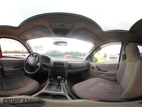 2003 Jeep Grand Cherokee Laredo with VIN 1J4GW48S73C611070, listed as a IAAI auction lot 42319030 with 177,771 mi miles and . Bid and sale history available at DreamBid. Image 18.