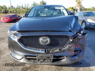2021 Mazda CX-5 Touring with VIN JM3KFBCM5M1484465, listed as a Copart auction lot 44201845 with 23,777 mi miles and Salvage Title. Bid and sale history available at carsss.com. Image 5.