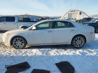 2012 Chevrolet Malibu LTZ with VIN 1G1ZG5E73CF270839, listed as a IAAI auction lot 41284490 with 133,423 mi miles and . Bid and sale history available at DreamBid. Image 14.