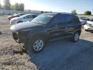 2015 Volkswagen Tiguan SE with VIN WVGAV7AX9FW611964, listed as a Copart auction lot 62938825 with 86,994 mi miles and Salvage title. Bid and sale history available at DreamBid. Image 1.