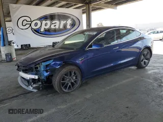 2020 Tesla Model 3 Long Range z VIN 5YJ3E1EB4LF636151, wystawiony jako Copart lot #59042295 z przebiegiem 52 175 mil mil oraz Szkoda całkowita • Salvage title. Historia ofert i sprzedaży dostępna na DreamBid. Obrazek 1.