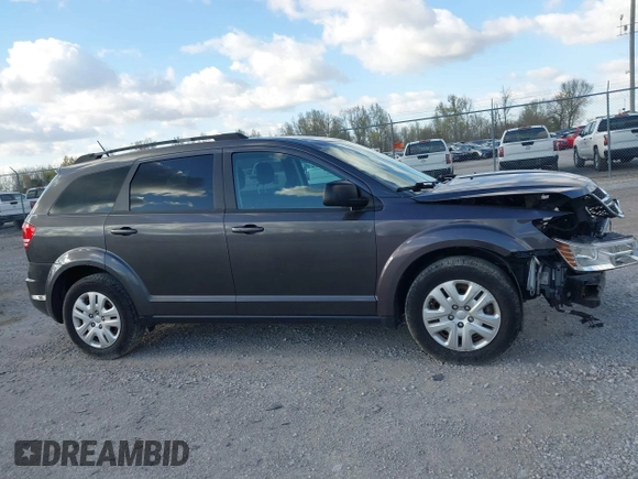 2017 Dodge Journey SE with VIN 3C4PDCAB0HT701477, listed as a IAAI auction lot 42025733 with 168,269 mi miles and . Bid and sale history available at DreamBid. Image 13.