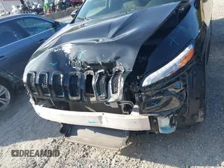 2018 Jeep Cherokee Latitude with VIN 1C4PJLCB0JD542574, listed as a IAAI auction lot 42506963 with 82,474 mi miles and . Bid and sale history available at DreamBid. Image 6.