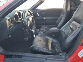 2002 Toyota MR2 z VIN JTDFR320X20050275, wystawiony jako Copart lot #78687794 z przebiegiem 183 243 mil mil oraz Szkoda całkowita • Salvage title. Historia ofert i sprzedaży dostępna na DreamBid. Obrazek 7.