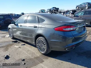 2018 Ford Fusion Titanium with VIN 3FA6P0D95JR138770, listed as a IAAI auction lot 41411388 with 107,540 mi miles. Bid and sale history available at carsss.com. Image 3.