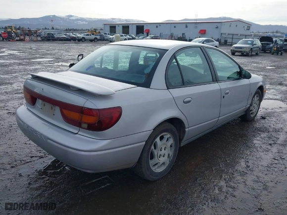 2000 Saturn SL with VIN 1G8ZJ527XYZ218993, listed as a IAAI auction lot 41603358 with 237,150 mi miles. Bid and sale history available at carsss.com. Image 4.