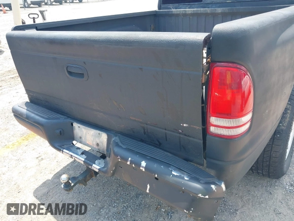 2004 Dodge Dakota SLT z VIN 1D7HG48N34S693877, wystawiony jako IAAI lot #42423197 z przebiegiem 163 141 mil mil oraz . Historia ofert i sprzedaży dostępna na DreamBid. Obrazek 6.