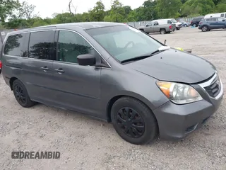 2010 Honda Odyssey LX z VIN 5FNRL3H24AB055902, wystawiony jako IAAI lot #42308308 z przebiegiem 123 491 mil mil oraz . Historia ofert i sprzedaży dostępna na DreamBid. Obrazek 1.
