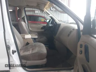 2004 Ford Escape XLS with VIN 1FMYU02134DA08567, listed as a IAAI auction lot 41872076 with 239,602 mi miles and . Bid and sale history available at DreamBid. Image 5.