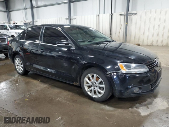 2012 Volkswagen Jetta Sedan SEL w/Sunroof with VIN 3VWLX7AJ4CM327525, listed as a Copart auction lot 83566654 with 180,612 mi miles and Salvage Title. Bid and sale history available at carsss.com. Image 4.