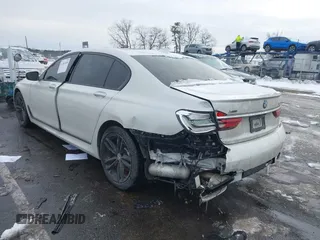 2018 BMW 7 Series 740i xDrive with VIN WBA7E4C59JGV23876, listed as a IAAI auction lot 41381398 with 106,675 mi miles. Bid and sale history available at carsss.com. Image 6.