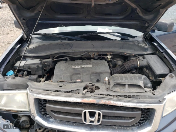 2010 Honda Ridgeline RT with VIN 5FPYK1F25AB004907, listed as a Copart auction lot 56617553 with 252,049 mi miles and Salvage Title. Bid and sale history available at carsss.com. Image 11.