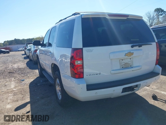 2013 Chevrolet Tahoe LT with VIN 1GNSCBE07DR256584, listed as a IAAI auction lot 39068684 with 139,897 mi miles and . Bid and sale history available at DreamBid. Image 3.