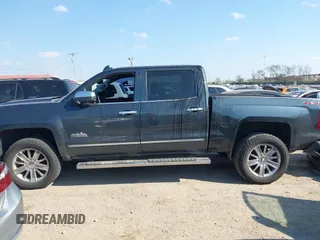 2018 Chevrolet Silverado 1500 High Country with VIN 3GCUKTEC8JG308353, listed as a IAAI auction lot 40714183 with 88,711 mi miles and . Bid and sale history available at DreamBid. Image 14.