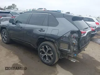 2021 Toyota RAV4 XSE with VIN JTMFB3FV7MD009432, listed as a IAAI auction lot 42439466 with 91,544 mi miles and . Bid and sale history available at DreamBid. Image 3.