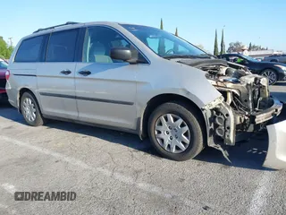 2006 Honda Odyssey LX with VIN 5FNRL382X6B070122, listed as a IAAI auction lot 41870970 with 243,026 mi miles. Bid and sale history available at carsss.com. Image 1.