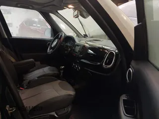 2015 FIAT 500L Urbana Trekking with VIN ZFBCFADHXFZ033922, listed as a IAAI auction lot 41650689 with 139,085 mi miles and . Bid and sale history available at DreamBid. Image 5.