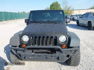 2008 Jeep Wrangler X with VIN 1J4FA24118L646979, listed as a IAAI auction lot 41981709 with 142,081 mi miles and . Bid and sale history available at DreamBid. Image 12.