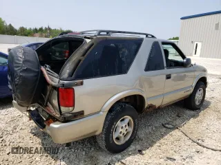2000 Chevrolet Blazer LS z VIN 1GNCT18W3YK175871, wystawiony jako Copart lot #58230204 z przebiegiem Nie podano mil oraz Nie do naprawy • Non repairable. Historia ofert i sprzedaży dostępna na DreamBid. Obrazek 3.