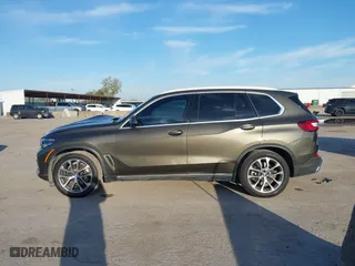 2023 BMW X5 sDrive40i with VIN 5UXCR4C02P9S02333, listed as a IAAI auction lot 41219318 with 32,966 mi miles. Bid and sale history available at carsss.com. Image 14.