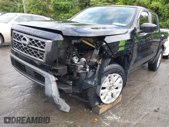 2023 Nissan Frontier SV with VIN 1N6ED1EK7PN609865, listed as a IAAI auction lot 42242070 with 56,462 mi miles and . Bid and sale history available at DreamBid. Image 6.