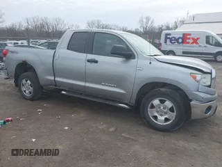 2007 Toyota Tundra SR5 with VIN 5TBBT54167S451515, listed as a IAAI auction lot 41827733 with 153,253 mi miles and . Bid and sale history available at DreamBid. Image 1.