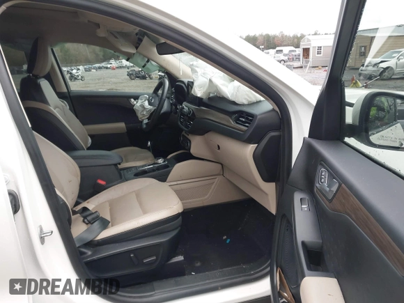 2020 Ford Escape Titanium Hybrid with VIN 1FMCU9DZ0LUC56274, listed as a IAAI auction lot 41256530 with 43,502 mi miles and . Bid and sale history available at DreamBid. Image 5.