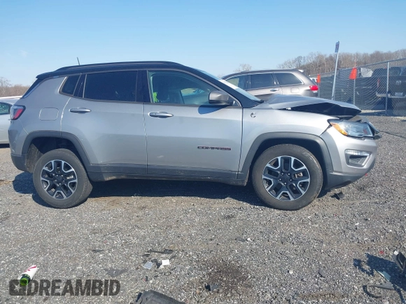 2020 Jeep Compass Trailhawk with VIN 3C4NJDDBXLT106663, listed as a IAAI auction lot 41791300 with 74,162 mi miles and . Bid and sale history available at carsss.com. Image 13.