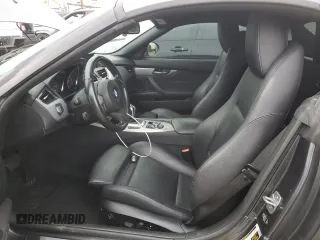 2014 BMW Z4 sDrive35i with VIN WBALM7C50EE385780, listed as a Copart auction lot 82884414 with 88,765 mi miles and Salvage Title. Bid and sale history available at carsss.com. Image 7.