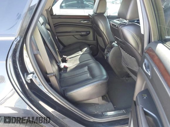 2013 Cadillac SRX Performance Collection with VIN 3GYFNHE35DS548632, listed as a IAAI auction lot 41990670 with 98,659 mi miles. Bid and sale history available at carsss.com. Image 8.