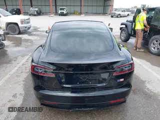 2022 Tesla Model S Plaid with VIN 5YJSA1E60NF460244, listed as a IAAI auction lot 41996403 with Not provided miles and . Bid and sale history available at DreamBid. Image 16.