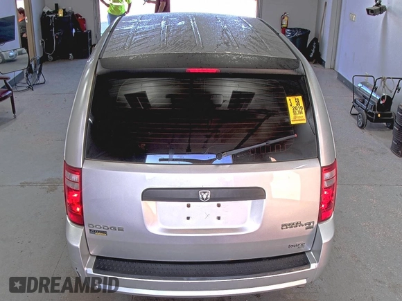 2010 Dodge Grand Caravan SE z VIN 2D4RN4DEXAR412152, wystawiony jako IAAI lot #42825395 z przebiegiem 93 398 mil mil oraz . Historia ofert i sprzedaży dostępna na DreamBid. Obrazek 22.