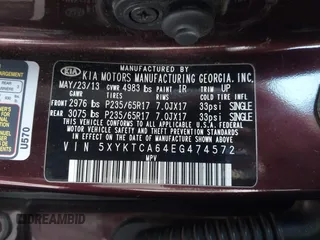 2014 Kia Sorento LX z VIN 5XYKTCA64EG474572, wystawiony jako IAAI lot #42325030 z przebiegiem 107 382 mil mil oraz . Historia ofert i sprzedaży dostępna na DreamBid. Obrazek 9.