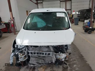 2015 Ford Transit Connect XLT z VIN NM0LS7F77F1207196, wystawiony jako IAAI lot #41157412 z przebiegiem Nie podano mil oraz . Historia ofert i sprzedaży dostępna na DreamBid. Obrazek 11.