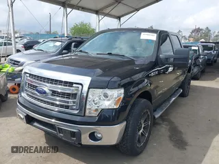 2014 Ford F-150 XL with VIN 1FTFW1CTXEKE56183, listed as a IAAI auction lot 41900304 with 94,597 mi miles and . Bid and sale history available at DreamBid. Image 2.