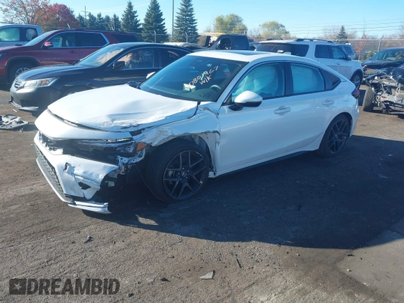 2024 Honda Civic Sport Touring z VIN 19XFL1G88RE019662, wystawiony jako IAAI lot #40801467 z przebiegiem 6 922 mil mil oraz . Historia ofert i sprzedaży dostępna na DreamBid. Obrazek 17.
