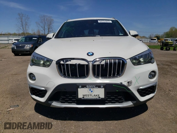 2019 BMW X1 xDrive28i with VIN WBXHT3C51K3H35953, listed as a Copart auction lot 54751675 with 54,802 mi miles and Salvage title. Bid and sale history available at DreamBid. Image 5.