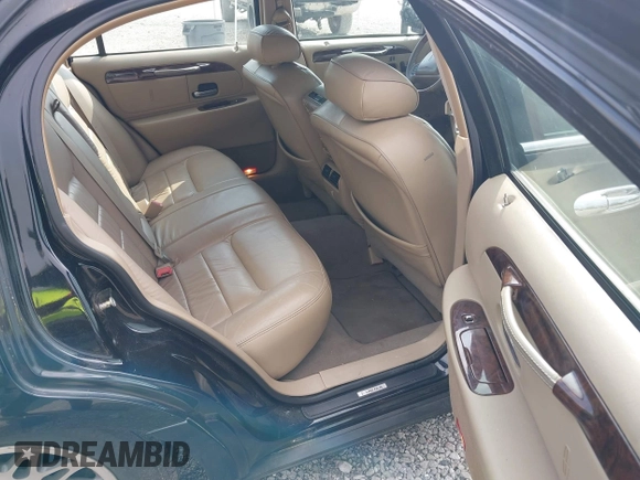 2001 Lincoln Town Car Signature with VIN 1LNHM82W11Y613959, listed as a IAAI auction lot 42432229 with 144,660 mi miles and . Bid and sale history available at DreamBid. Image 8.