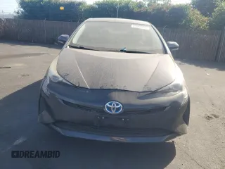 2016 Toyota Prius Two z VIN JTDKBRFU7G3520531, wystawiony jako Copart lot #57690325 z przebiegiem Nie podano mil oraz Czysty tytuł • Clean title. Historia ofert i sprzedaży dostępna na DreamBid. Obrazek 5.