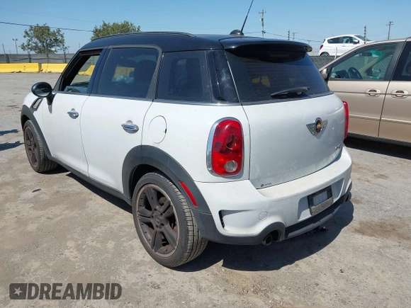 2011 MINI Countryman S z VIN WMWZC3C50BWM26002, wystawiony jako IAAI lot #42383758 z przebiegiem 188 443 mil mil oraz . Historia ofert i sprzedaży dostępna na DreamBid. Obrazek 3.
